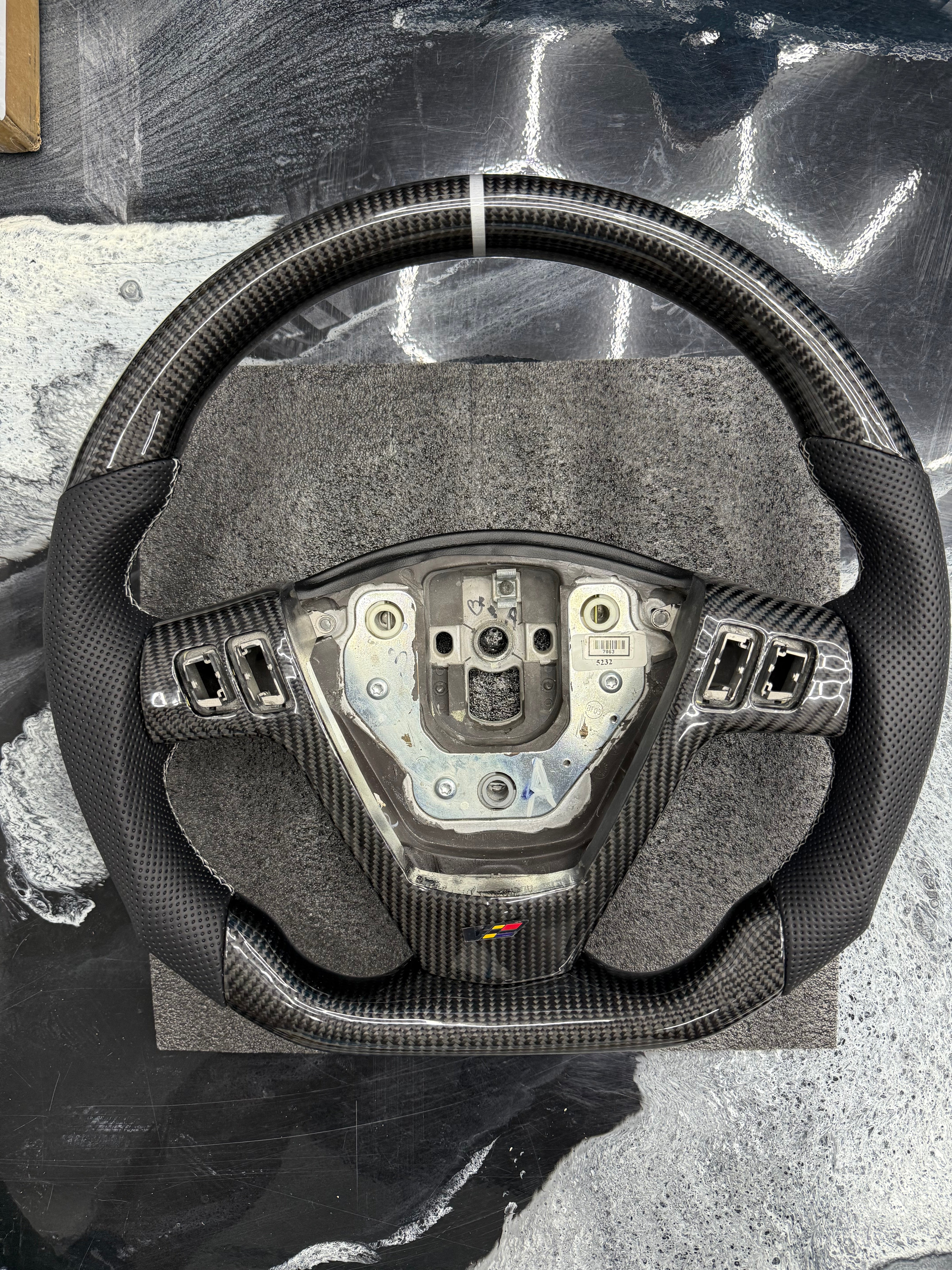2003 - 2008 CTS, CTS-V V1 Custom Carbon Fiber Steering Wheel with Perforated Leather Hand Grips / Leather Rear Cover